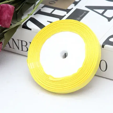 Tasiemka satynowa żółta 10mm x 22m Tasiemka satynowa żółta 10mm x 22m