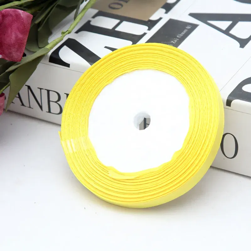 Tasiemka satynowa żółta 10mm x 22m Tasiemka satynowa żółta 10mm x 22m